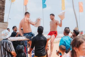 Tourists taking part in Kotta Pora pillow fights during Avurudu celebrations in Browns Hotel