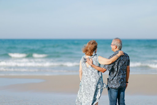 Senior couple enjoying a calm Sri Lankan beach during a relaxed coastal holiday