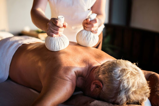 Herbal bolus massage during supervised Panchakarma treatment in Sri Lanka