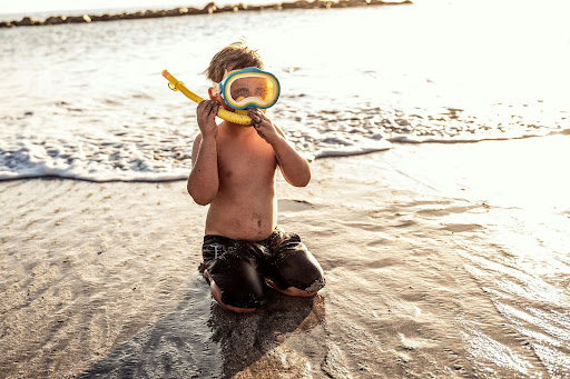Child preparing for family-friendly snorkelling in Sri Lanka