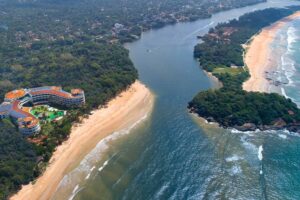 Aerial view of Occidental Eden Beruwala beside the golden sands of Beruwala Beach, Sri Lanka