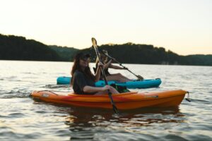  Kayaking on a calm river in Sri Lanka during sunset with scenic surroundings