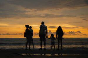 Family holiday in Sri Lanka on Negombo beach at sunset