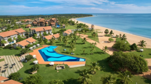 Aerial view of The Calm Resort & Spa beside Pasikuda Beach