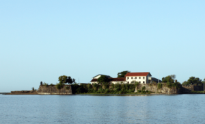 Historic Batticaloa Fort beside calm lagoon waters