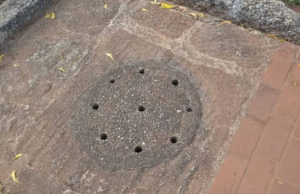Close view of a stone fountain outlet