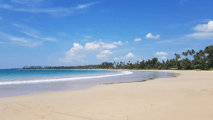 View of Dickwella Beach from the sandy shoreline