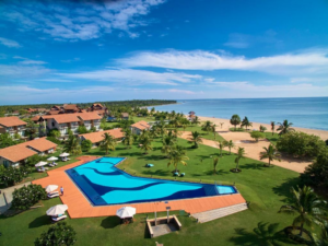 Aerial view of the pool at The Calm Resort & Spa in the afternoon