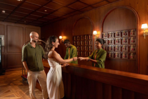 Two guests at Newburgh Ella's reception desk