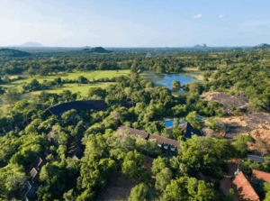 Aerial view of The Paradise Dambulla surrounded by jungle wilderness