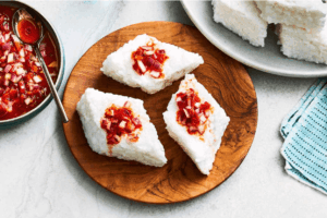 Kiribath, traditional Sri Lankan milk rice, served with lunu miris.